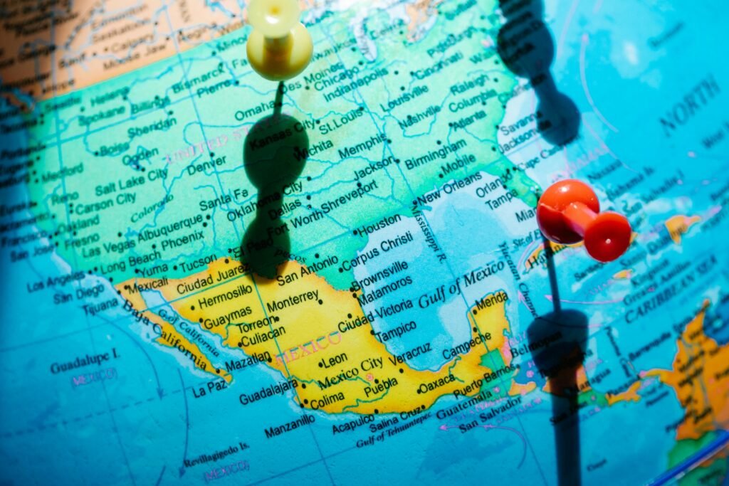 Detailed map of North America featuring pushpins highlighting regions in Mexico and the US.